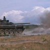 Tank při střelbě