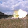 Tank při střelbě